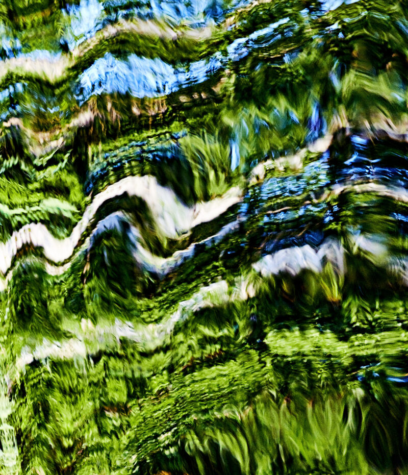 Serene Fine Art Photography print capturing the essence of the Nordic landscape in an abstract form. Vibrant greens, cool blues, and soft whites flow together, evoking the raw, untamed beauty of the North and Finnish nature. Distorted textures and wave-like patterns reflect the ever-changing environment—where stillness meets movement, and clarity dissolves into abstraction. Printed on archival Hahnemühle Fine Art paper with a velvety matte surface that enhances texture and depth. Available as a Diasec TruLife® Acrylic Fine Art Print or a traditional framed Fine Art print with passepartout behind ArtGlass™ museum glass, both offering exceptional archival quality and UV protection.