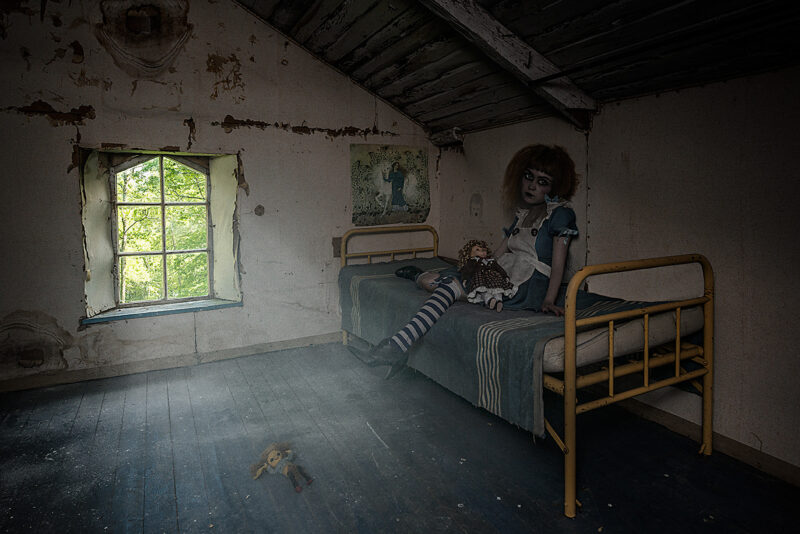 A surreal Fine Art Photography piece by Irina Hurme from the Dolls series. Set in an abandoned interior and carefully staged with a live model and selected props, the image explores themes of abandonment and solitude. Available as museum-grade Fine Art prints in limited editions from Galleria Green.